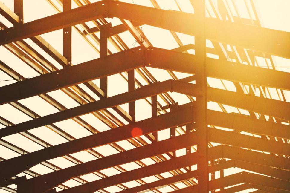 Free Image of Sun Shining Through Roof of Building 