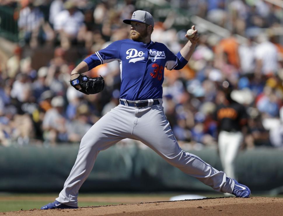 Free Image of Baseball Player Pitching Ball on Field 