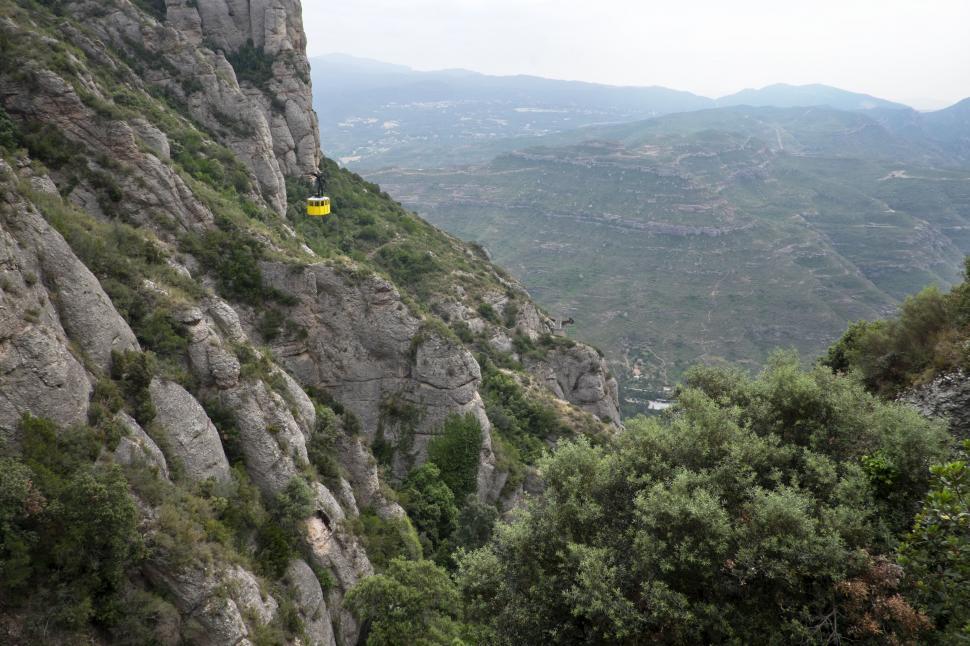 Free Image of Mountain With Yellow Sign 