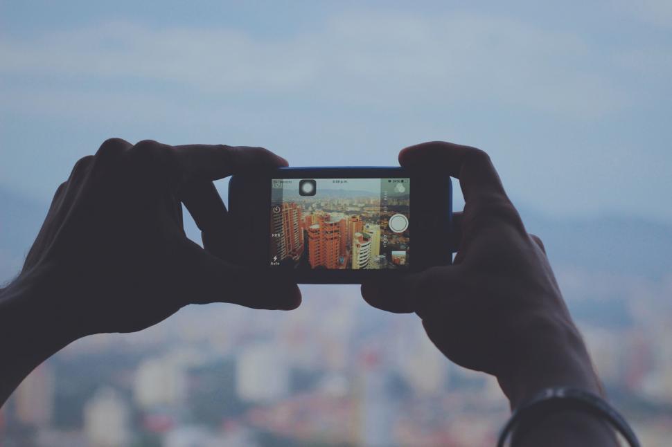 Free Image of Person Taking a Picture With a Cell Phone 