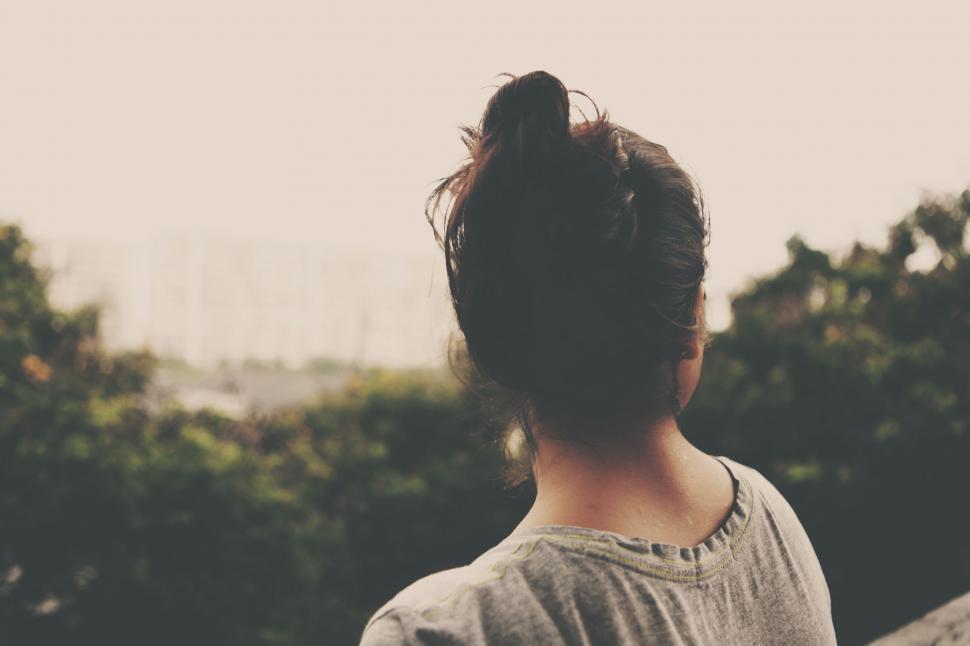 Free Image of Woman With Hair in a Bun 
