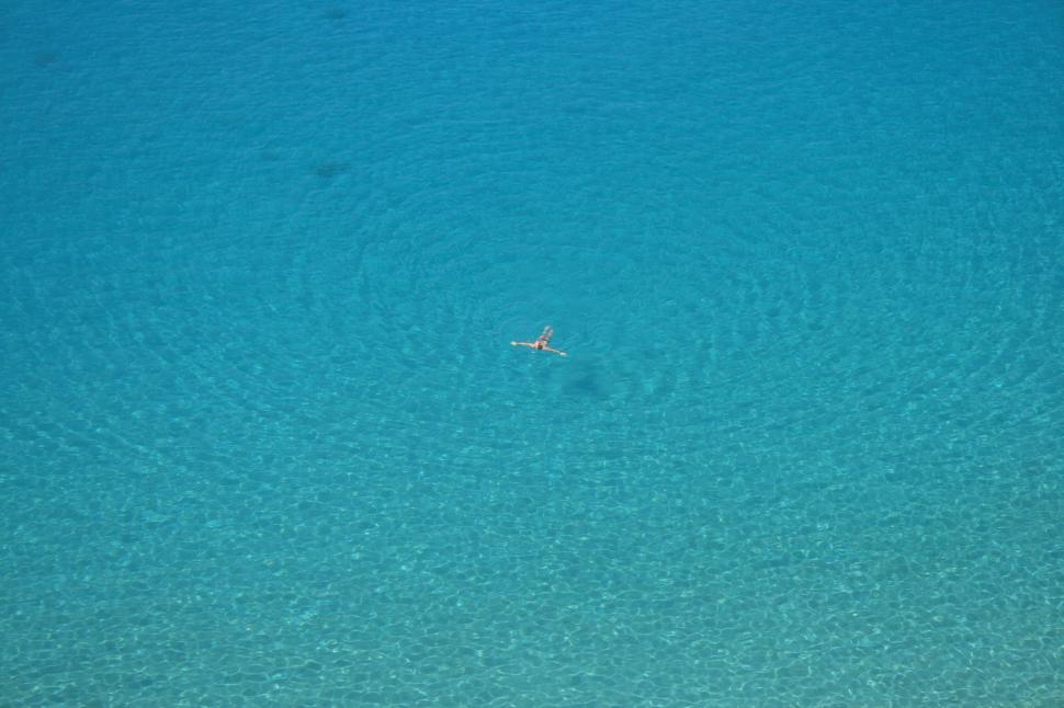 Free Image of Plane Flying Over Body of Water 