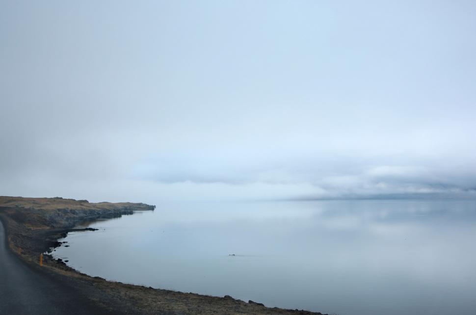 Free Image of Large Body of Water Surrounded by Land 