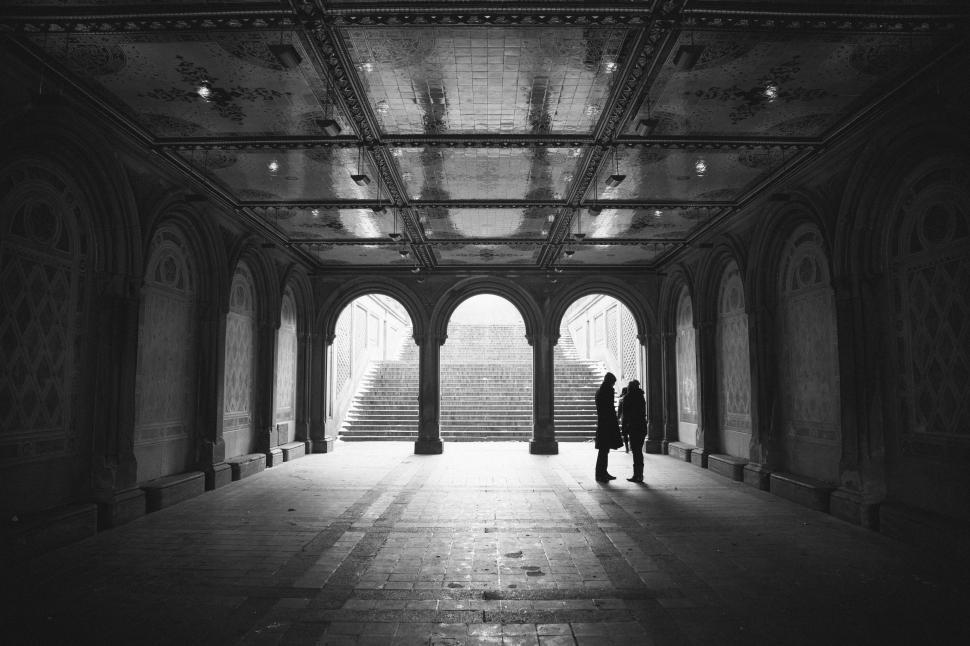 Free Image of People Standing in a Spacious Room 