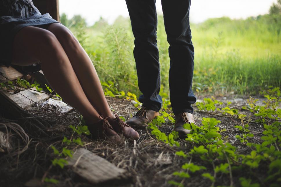 Free Image of Couple Sitting on a Bench in the Park 