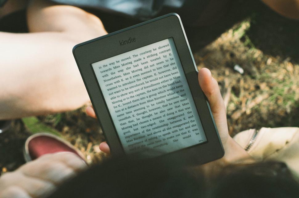Free Image of Person Holding Electronic Device Close-Up 