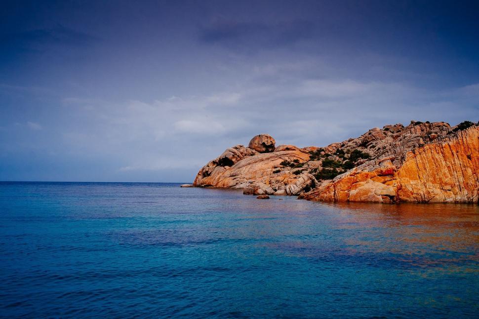 Free Image of Rock Outcropping in the Middle of the Ocean 