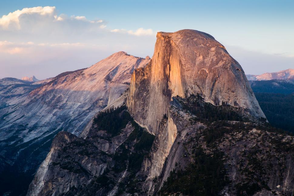 Free Image of Majestic Mountain Summit Under Blue Sky 