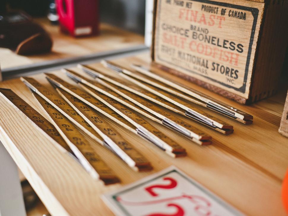 Free Image of Wooden Table Covered With Various Tools 