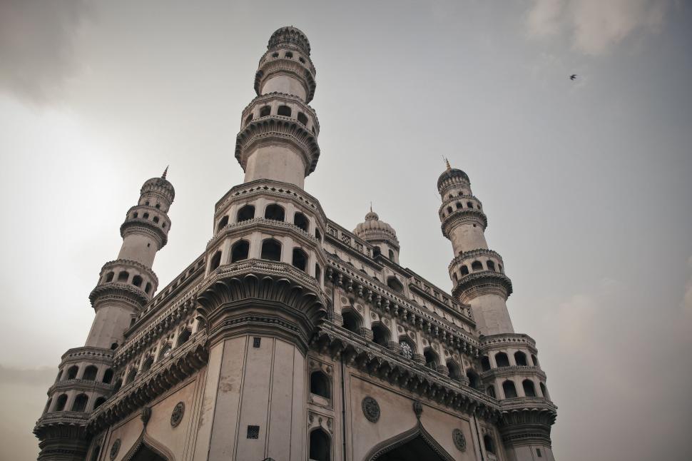Free Image of Towering Building With Clock on Side 
