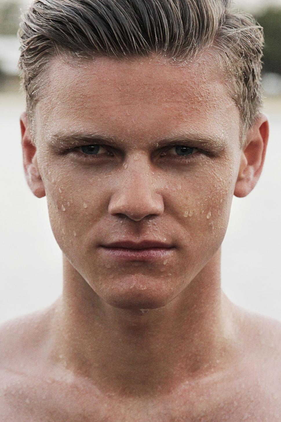 Free Image of Shirtless Man With Shaved Head 