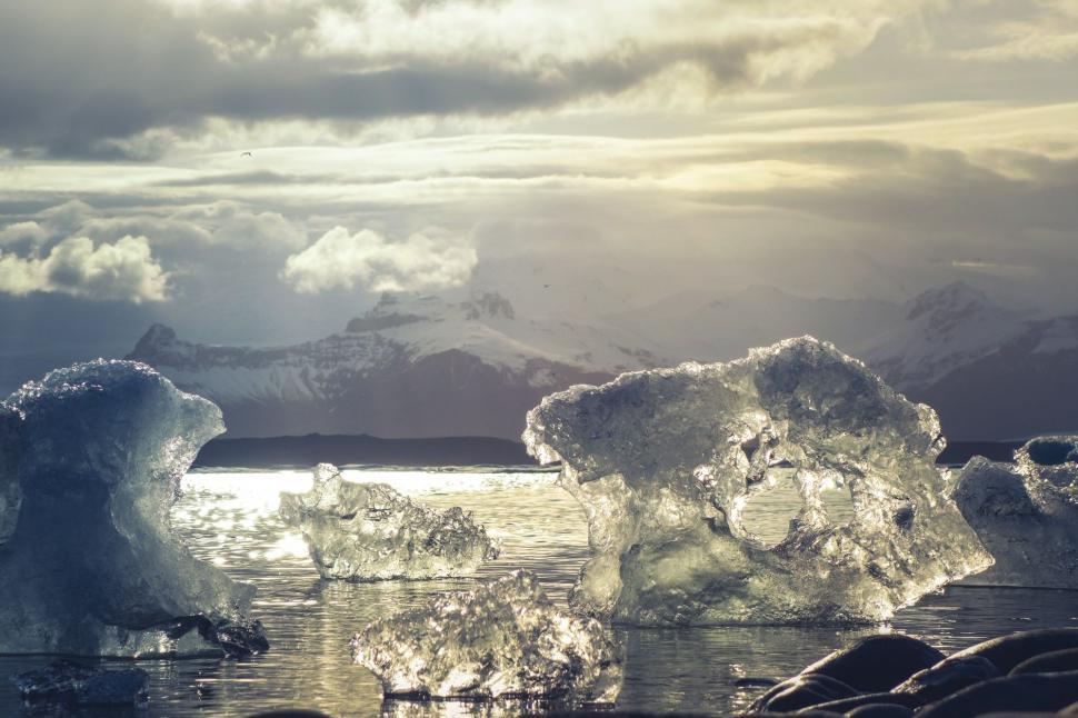 Free Image of Group of Icebergs Floating on Water 