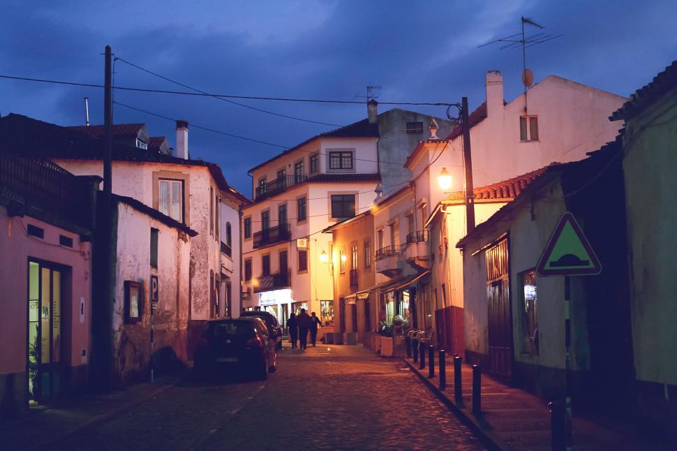 Free Image of City Street at Night With Parked Cars 