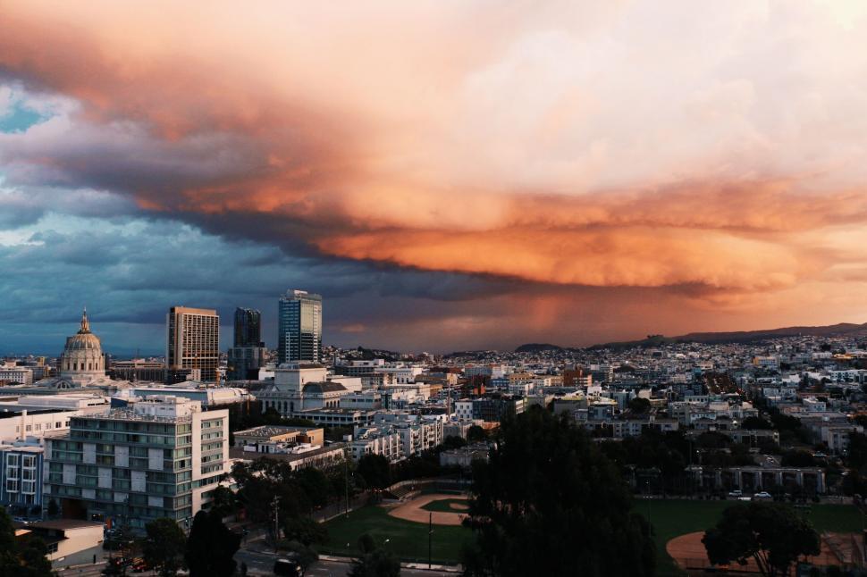 Free Image of Large Cloud in Sky Over City 