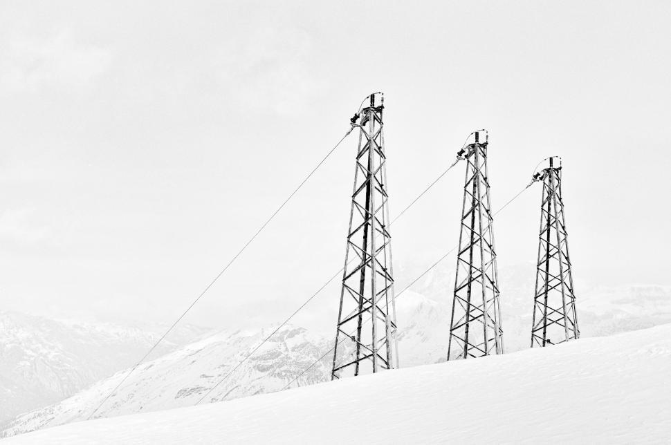Free Image of Man Snowboarding Down Snowy Slope 