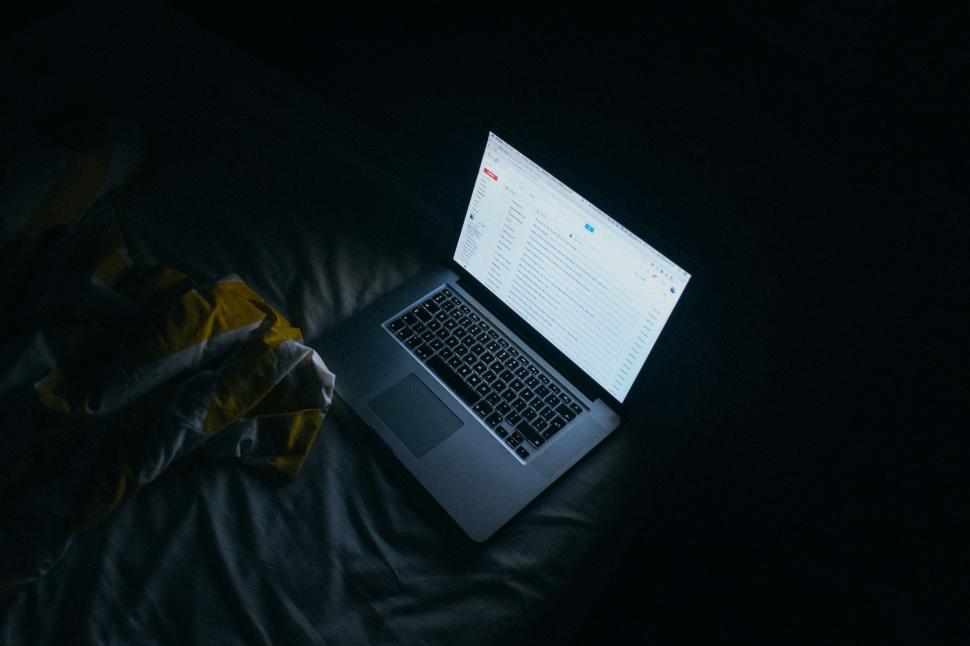 Free Image of Open Laptop Computer on Bed 