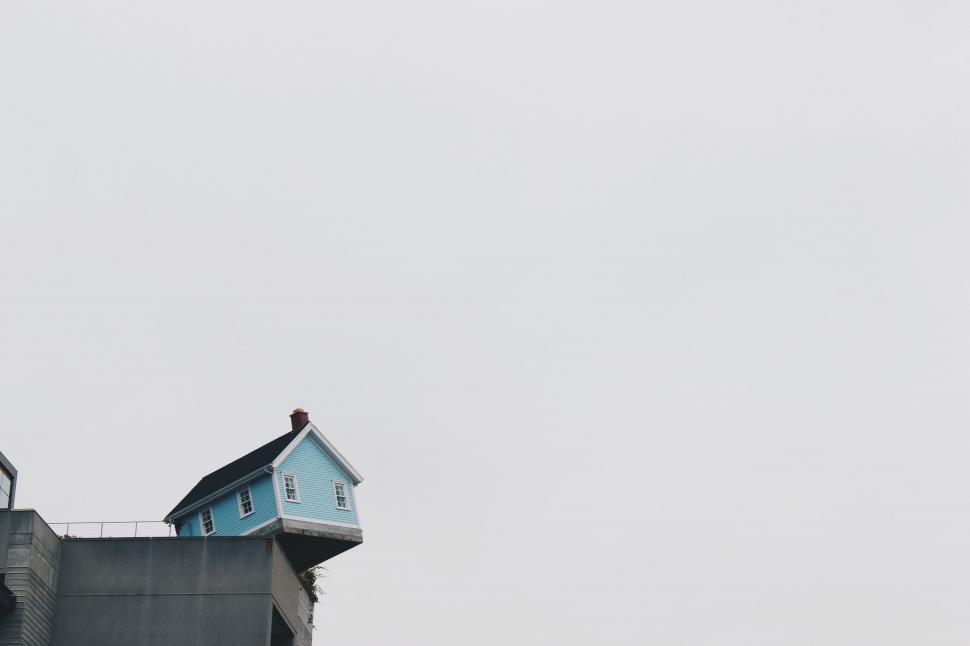 Free Image of Clock Tower With House on Top 