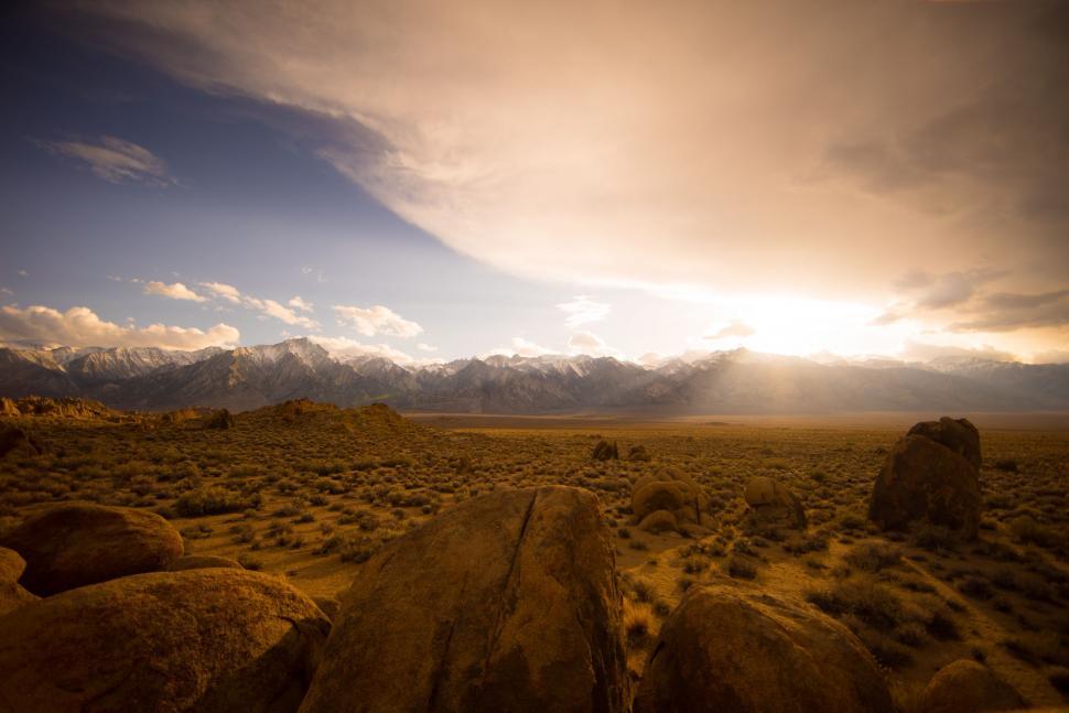 Free Image of Desert Landscape With Rocks and Mountains 