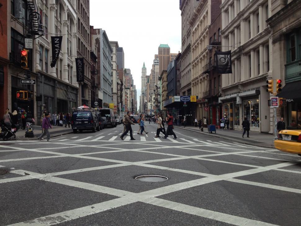 Free Image of Bustling City Street With Tall Buildings 