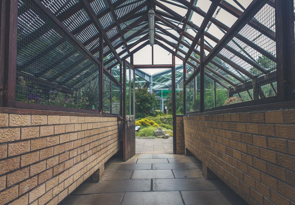 Free Image of Walkway With Windows in a Building 
