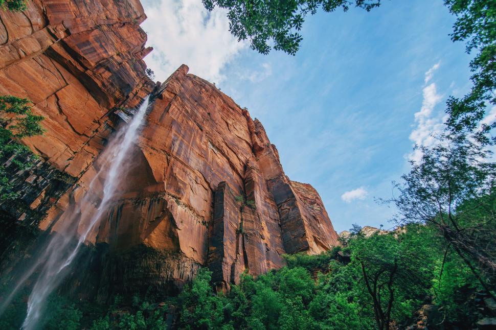 Free Image of Waterfall Cascading From Cliffside 
