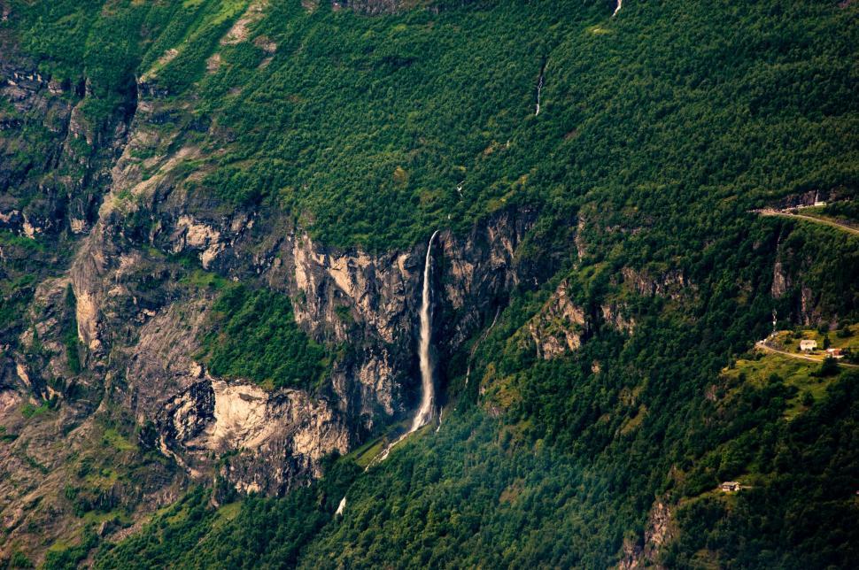 Free Image of Majestic Mountain With Cascading Waterfall 