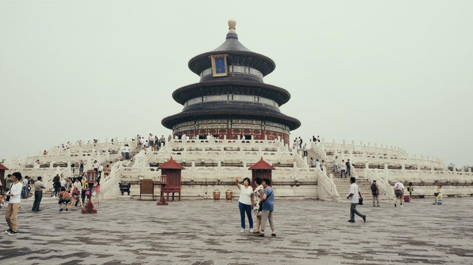 Free Image of Group of People Standing in Front of Building 