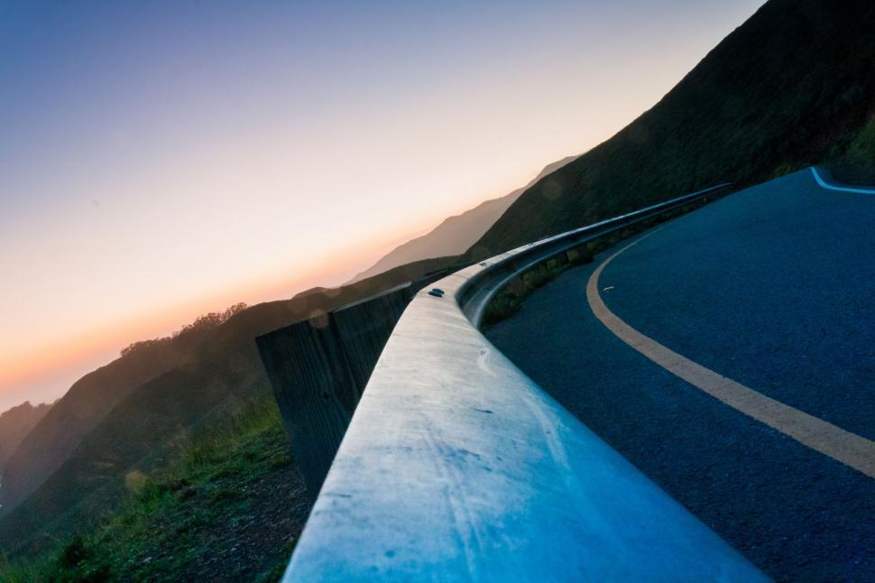 Free Image of Person Riding Skateboard Down Hill 