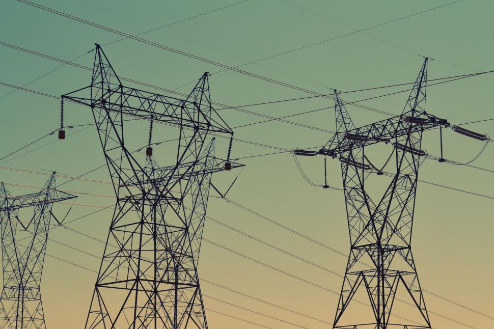 Free Image of Group of Power Lines Against Sky 