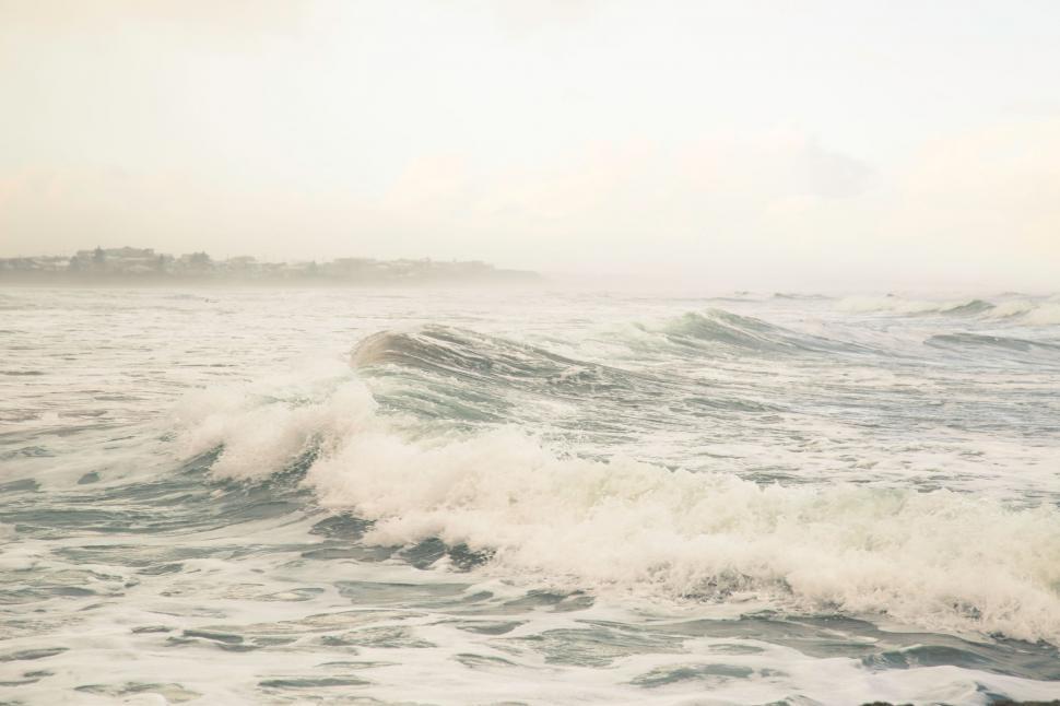 Free Image of Man Riding Surfboard on Wave in Ocean 
