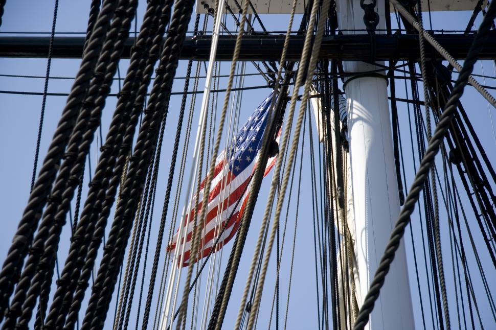 Free Image of American Flag Flies on Mast of Tall Ship 
