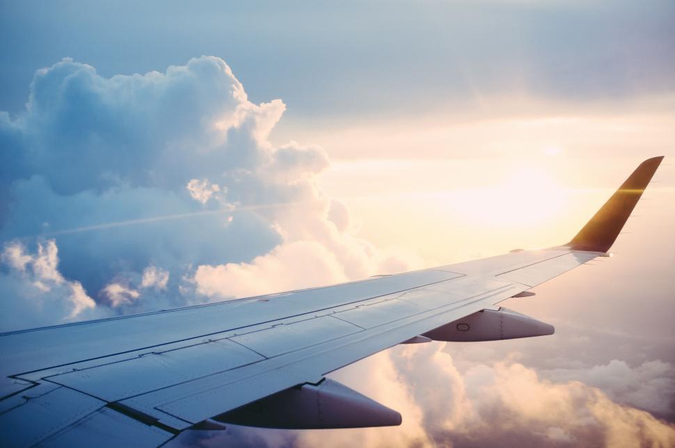 Free Image of A View of the Wing of an Airplane in the Sky 