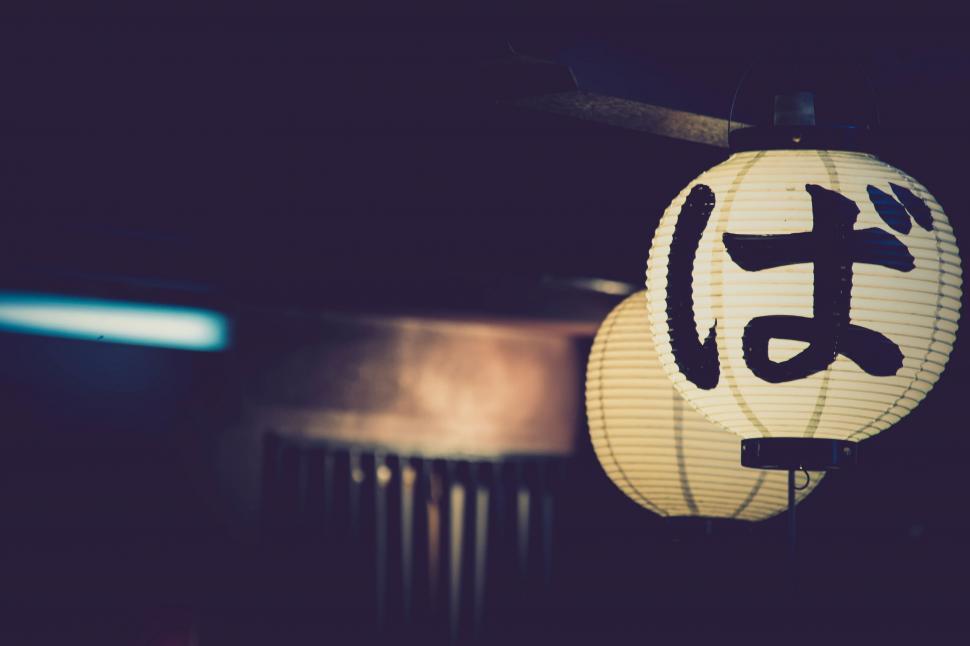 Free Image of Chinese Lantern Hanging in Dark Room 