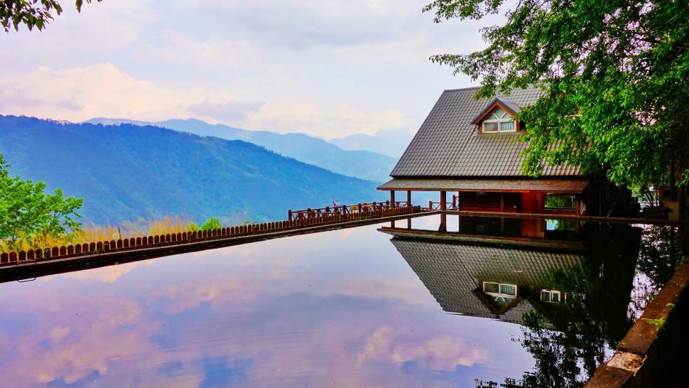 Free Image of House Overlooking Lake by Forest 