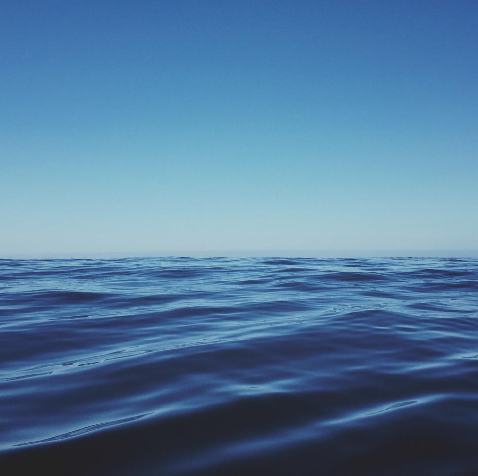 Free Image of Vast Water Body Under Blue Sky 