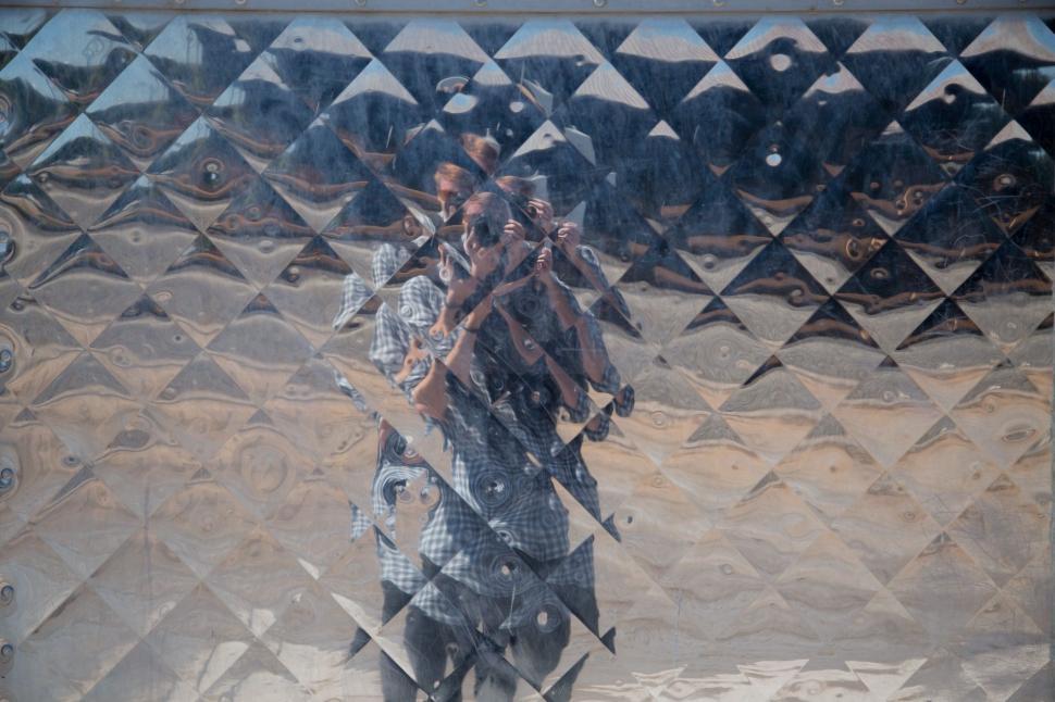 Free Image of Persons Reflection in Glass Window 