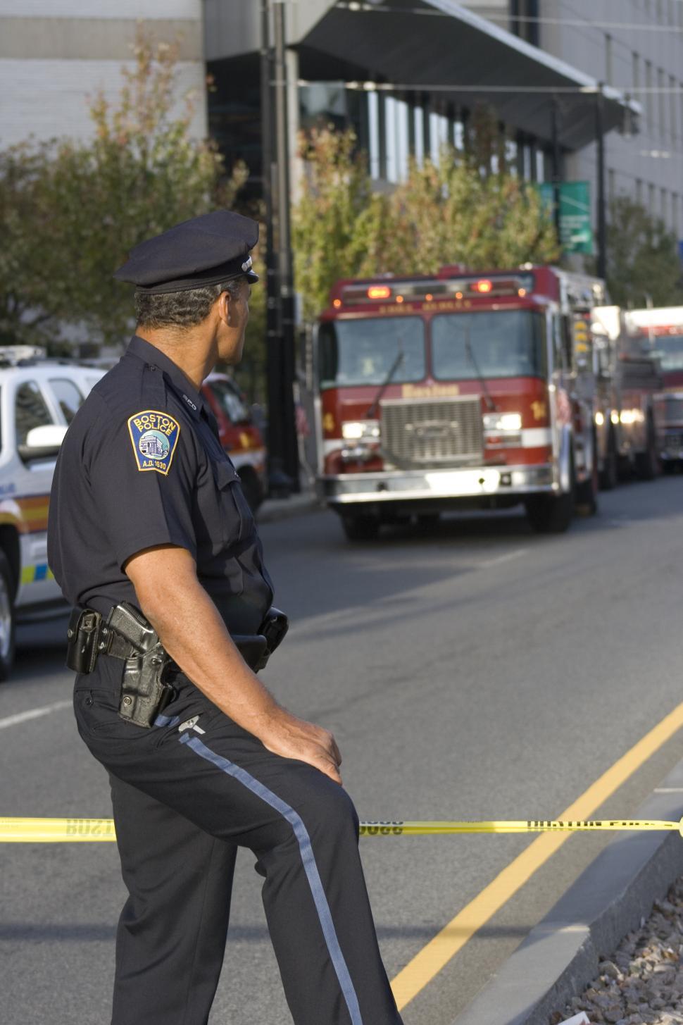 Free Image of Policeman and Firetruck 