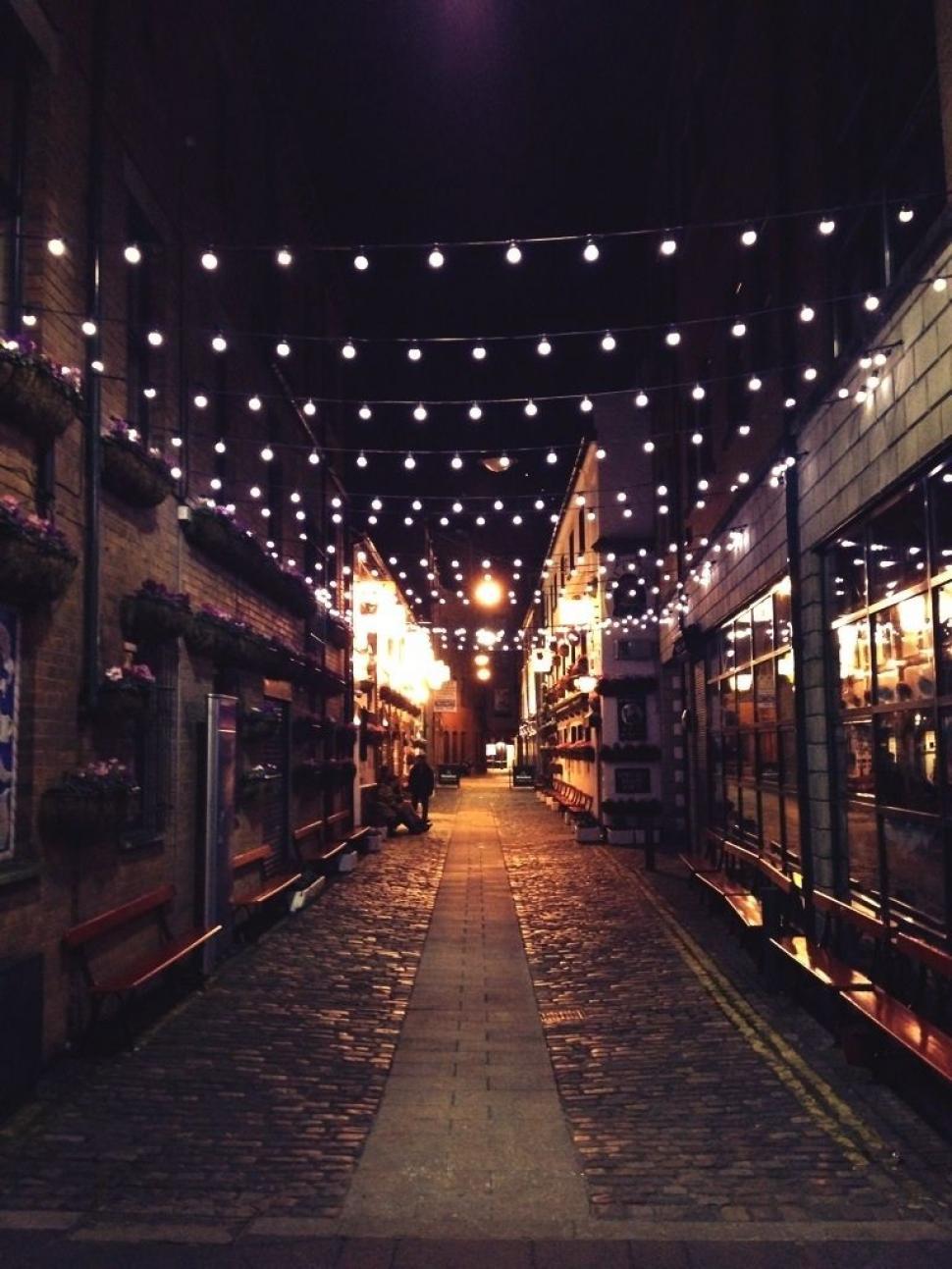Free Image of Dark Alley With Ceiling Lights 