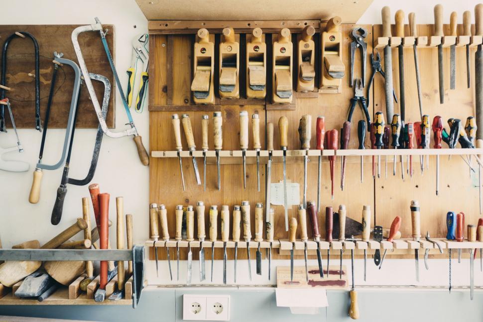 Free Image of Assorted Tools Hanging on Wall 