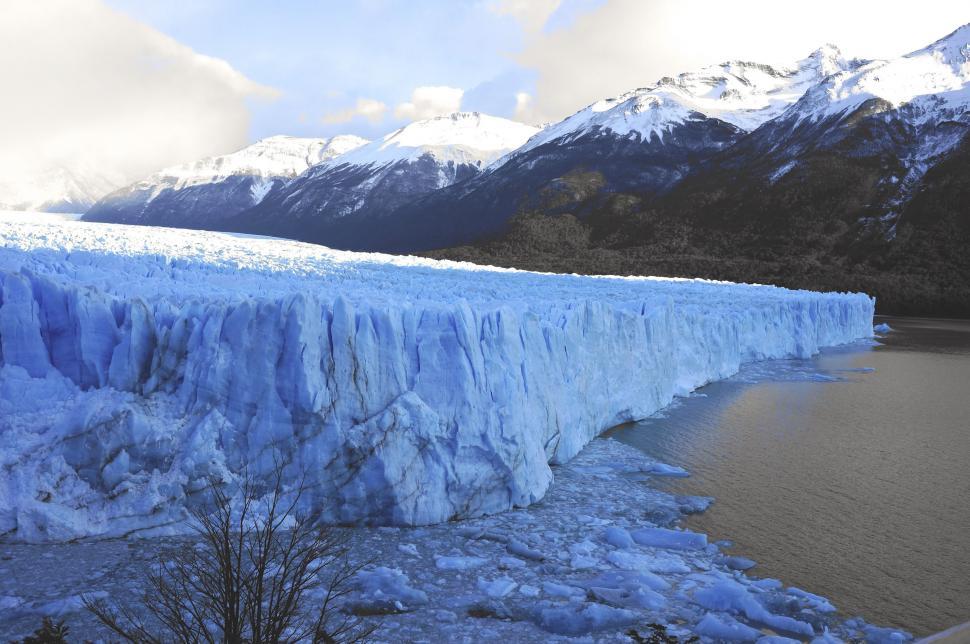 Free Image of Majestic Ice-Covered Mountain by Water 