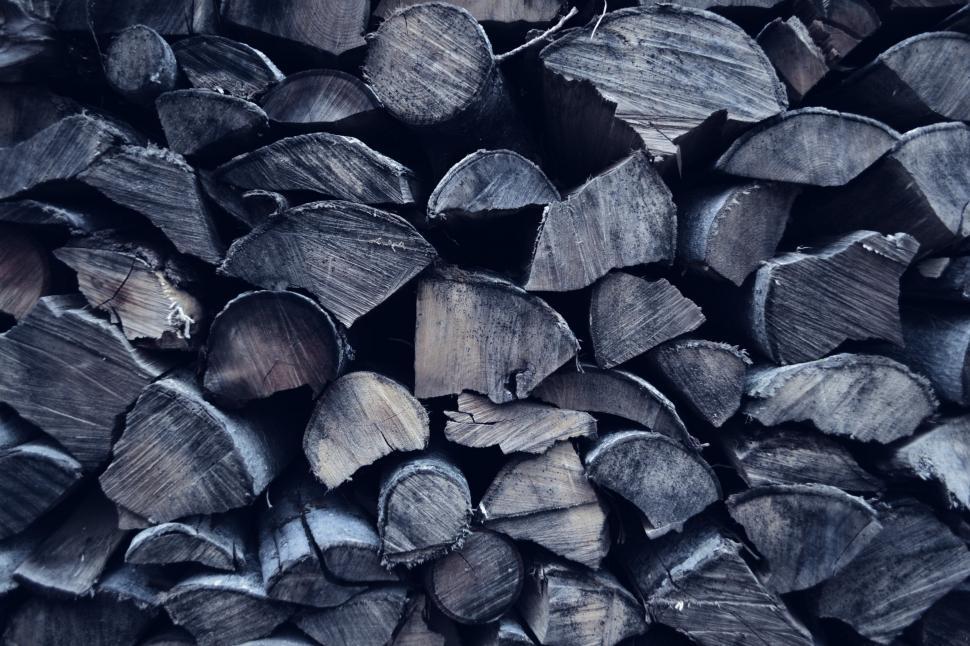 Free Image of A Pile of Wood in Black and White 