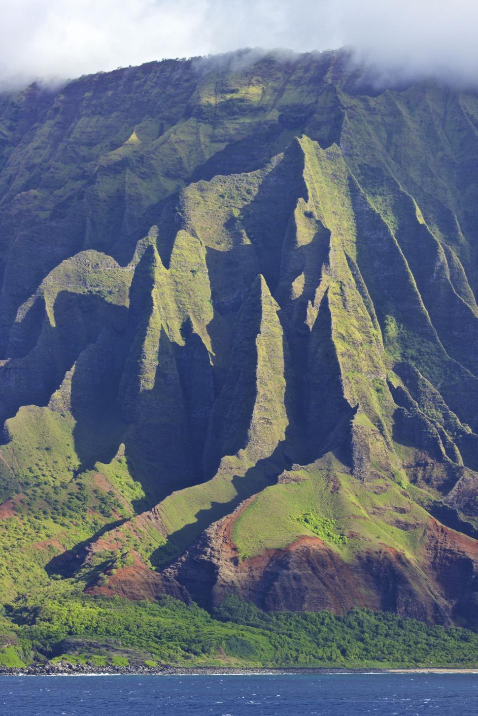 Free Image of Boat Sailing Near Mountain 