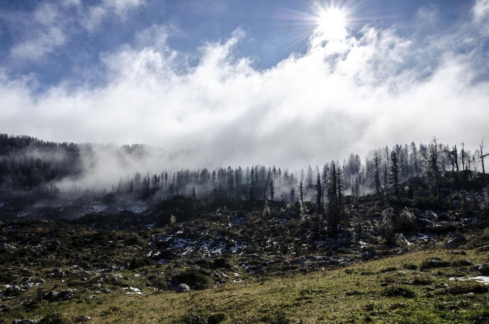 Free Image of Sun Shines on Foggy Mountain Landscape 