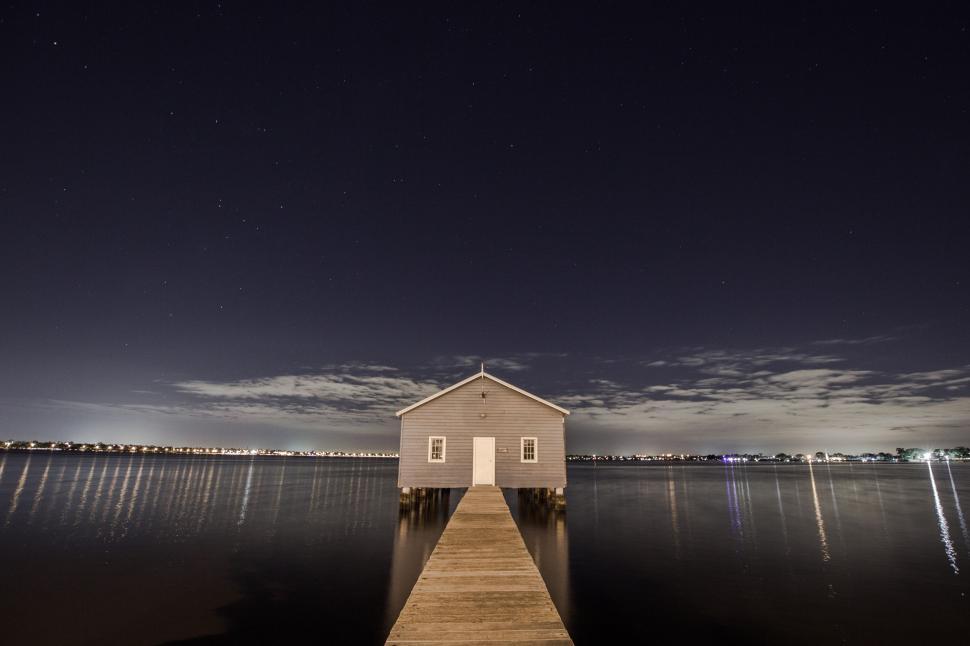 Free Image of Small House on Wooden Pier 