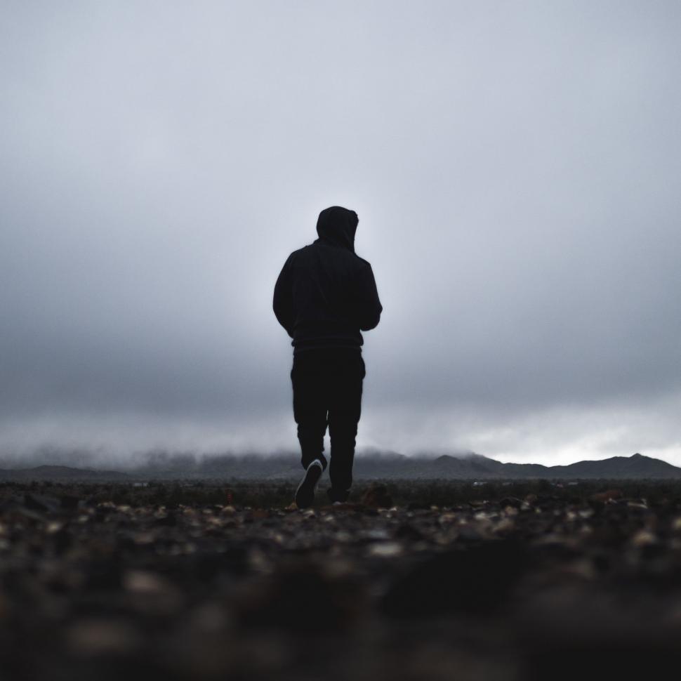 Free Image of Man Standing in Field 