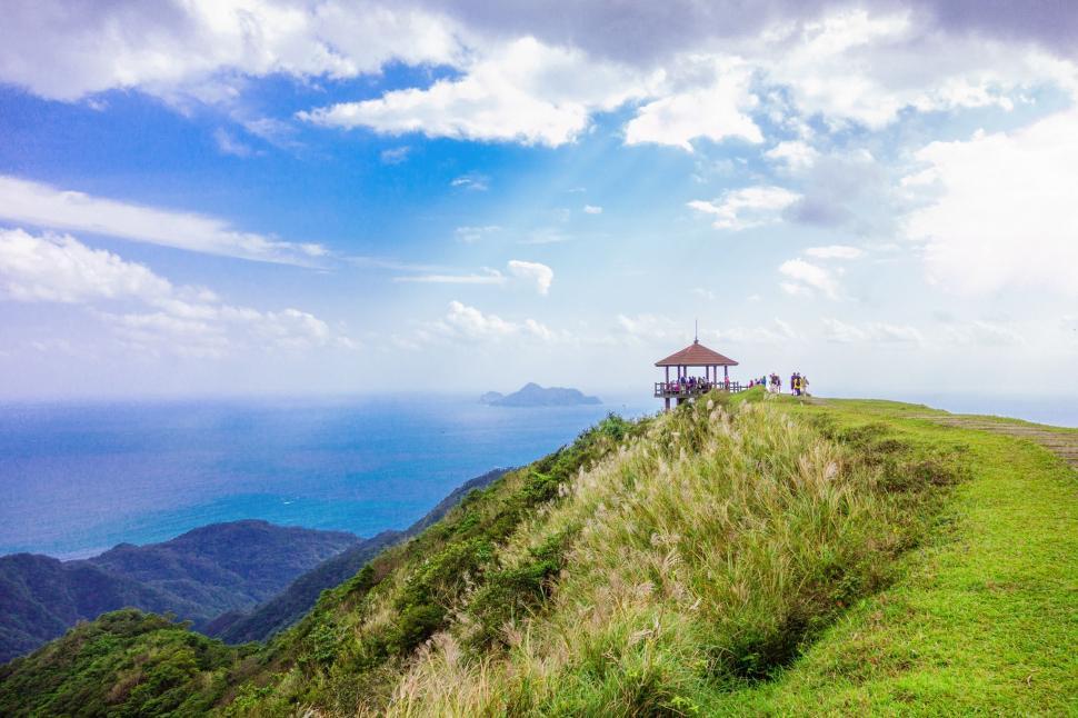 Free Image of Grassy Hill With Gazebo 