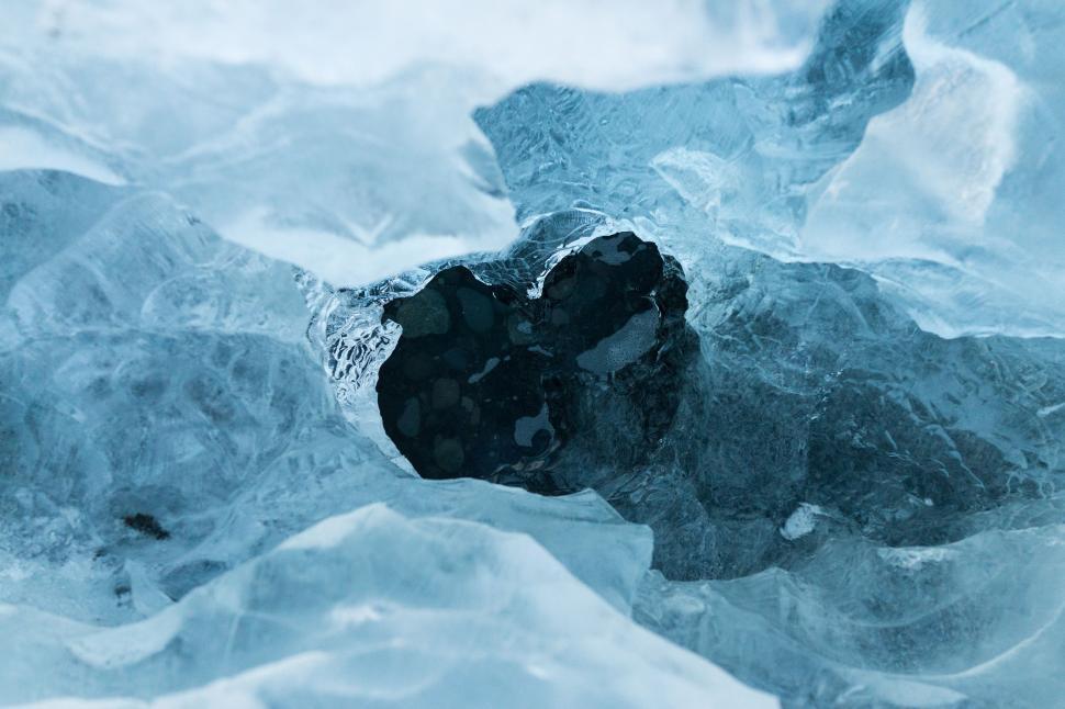 Free Image of Black Ice on Snow Covered Ground 