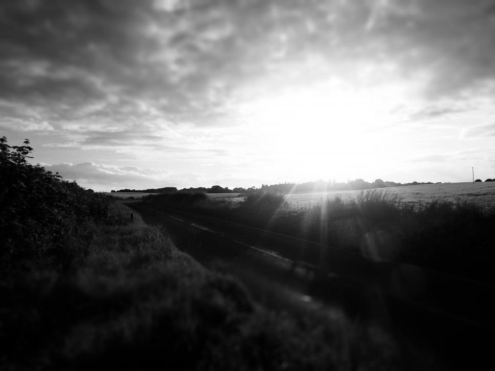 Free Image of Sun Shining Through Clouds 