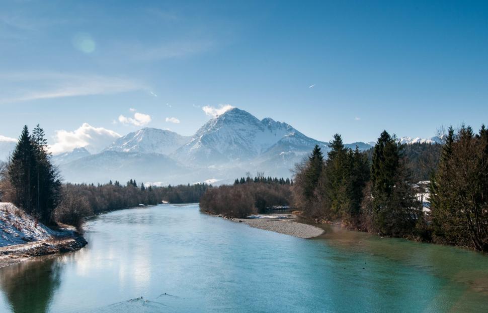 Free Image of River Flowing With Mountain Background 