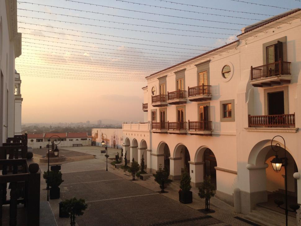 Free Image of Building With Numerous Balconies and Rooftop Terraces 
